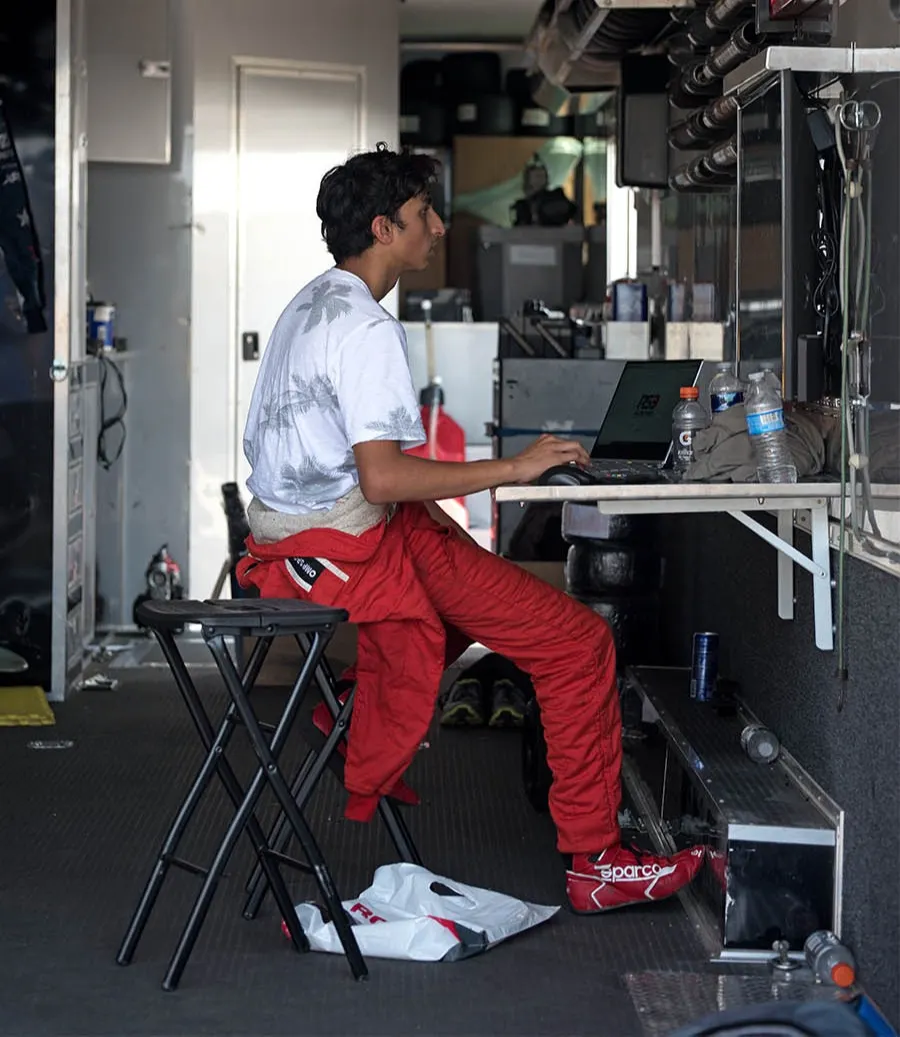 Atharva in racing suit